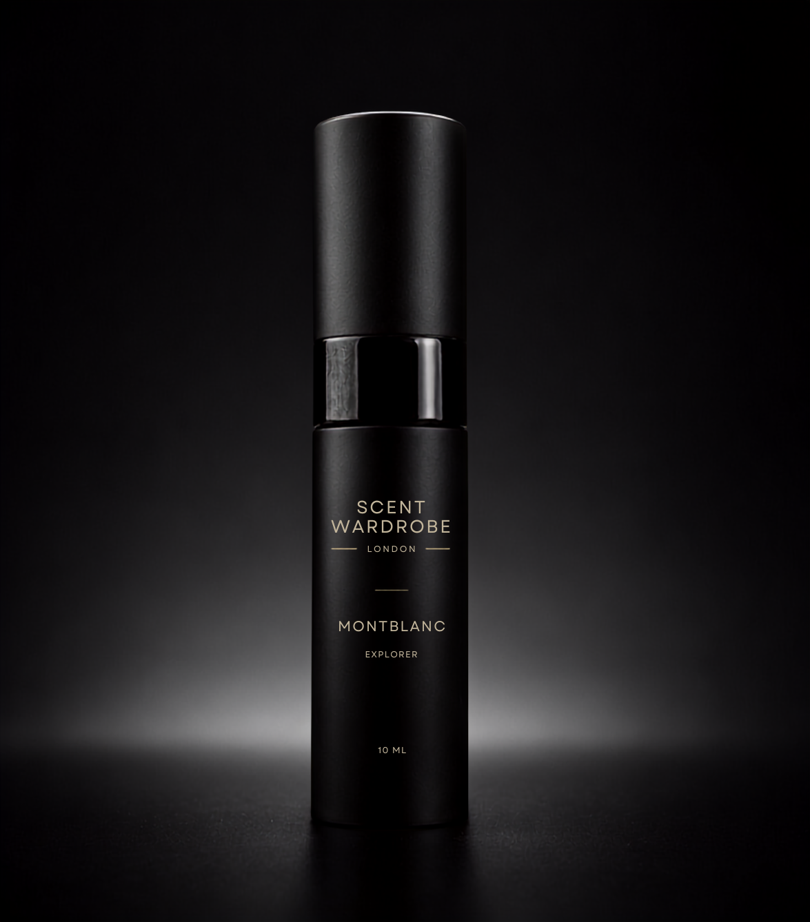 Matte black Scent Wardrobe 10ml atomiser containing Montblanc Explorer Eau de Parfum, photographed against a dark studio background.